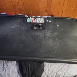 Poker table with automatic shuffler and tray holder for chips