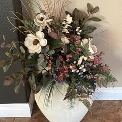 Large Floral arrangement with white vase.
