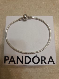Pandora Sterling Silver Bracelet.  Weight is 16.3 grams
