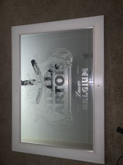 Stella Artois mirror 41-5/8 X 29-5/8 inches.