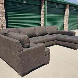 Delivery Available.Extra large U Shaped Sectional (Practically New)