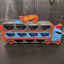 Hot Wheels Mega Hauler Truck – 6-Level Car Carrier, Storage Transporter (Blue/Red) 