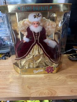 Barbie Happy Holidays 1996 Special Edition Doll Mattel 15646 New In Box!!!  The 1996 Celebration Special Edition Barbie Doll by Mattel is a collectibl