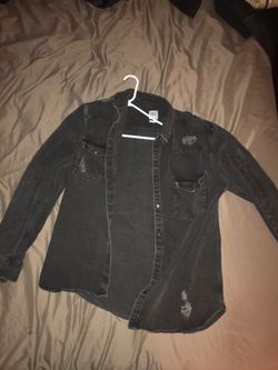 Distressed black jean jacket. Hardly worn