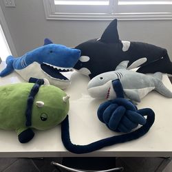 Stuffed sharks and sea animals.   5 dollars each