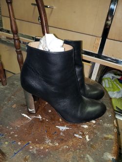 Black leather Calvin Klein boots