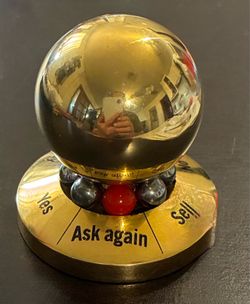 Brass spinning decision helper/paper weight
