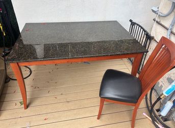 Solid granite slab table and 2 dinning room chairs
