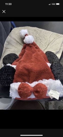 Disney Parks Christmas Santa Minnie Mouse Ears Plush Hat NWT hat size says youth but it's more like for a 1-2 years of age Serious inquires only Low o