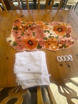 Shower curtain with hooks and bathroom rug