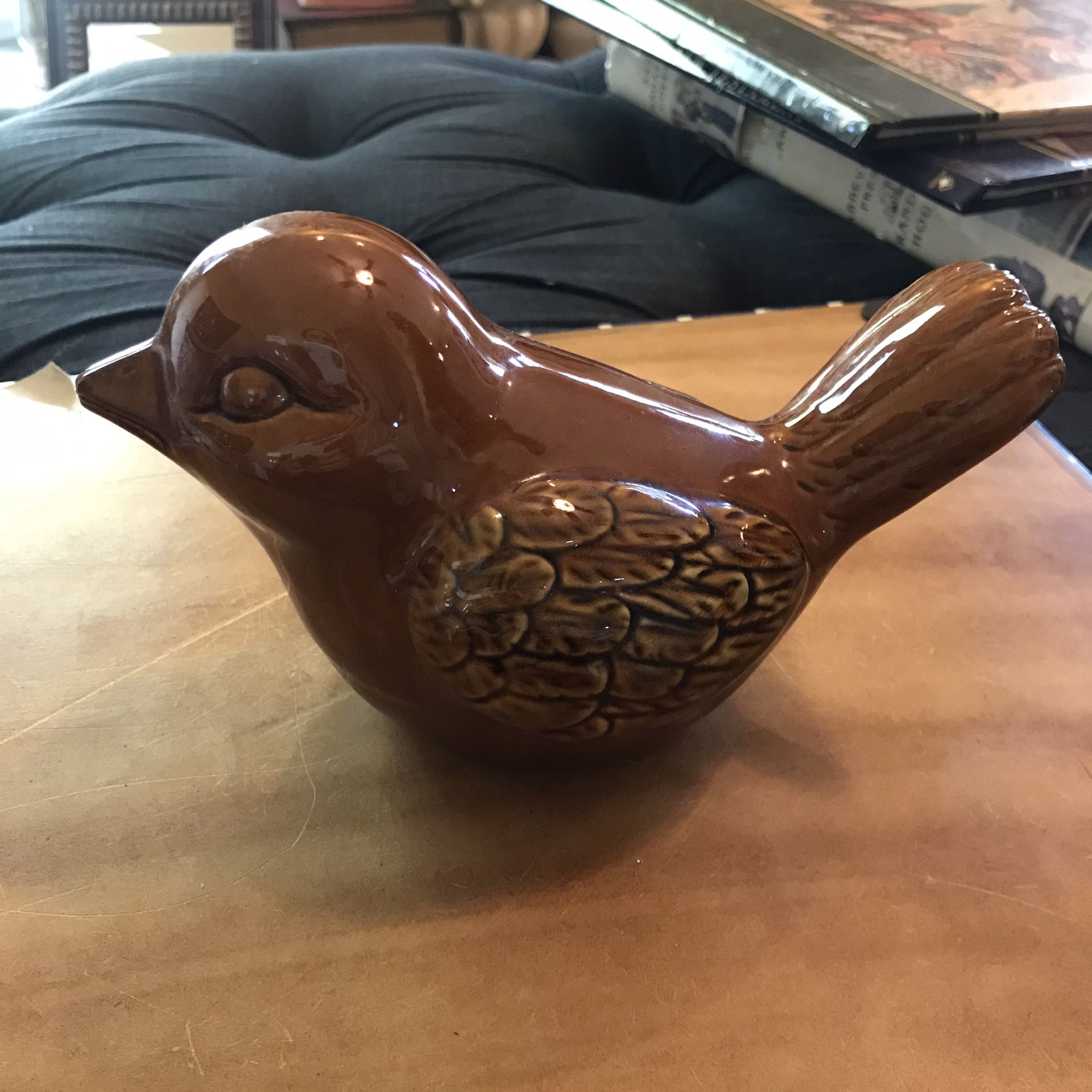 Brown ceramic bird figurine