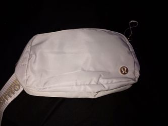 Creamy heather gray Lululemon cross bag.