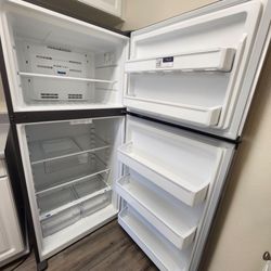 One year used fridge w/ 3 year warranty