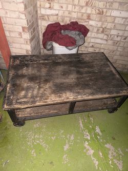 Brown coffee table with wheels