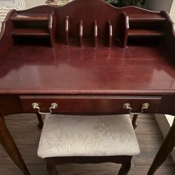Quaint Cherry Wood Desk with Padded Stool. Desk measures 36” H, 32” W, 18” D