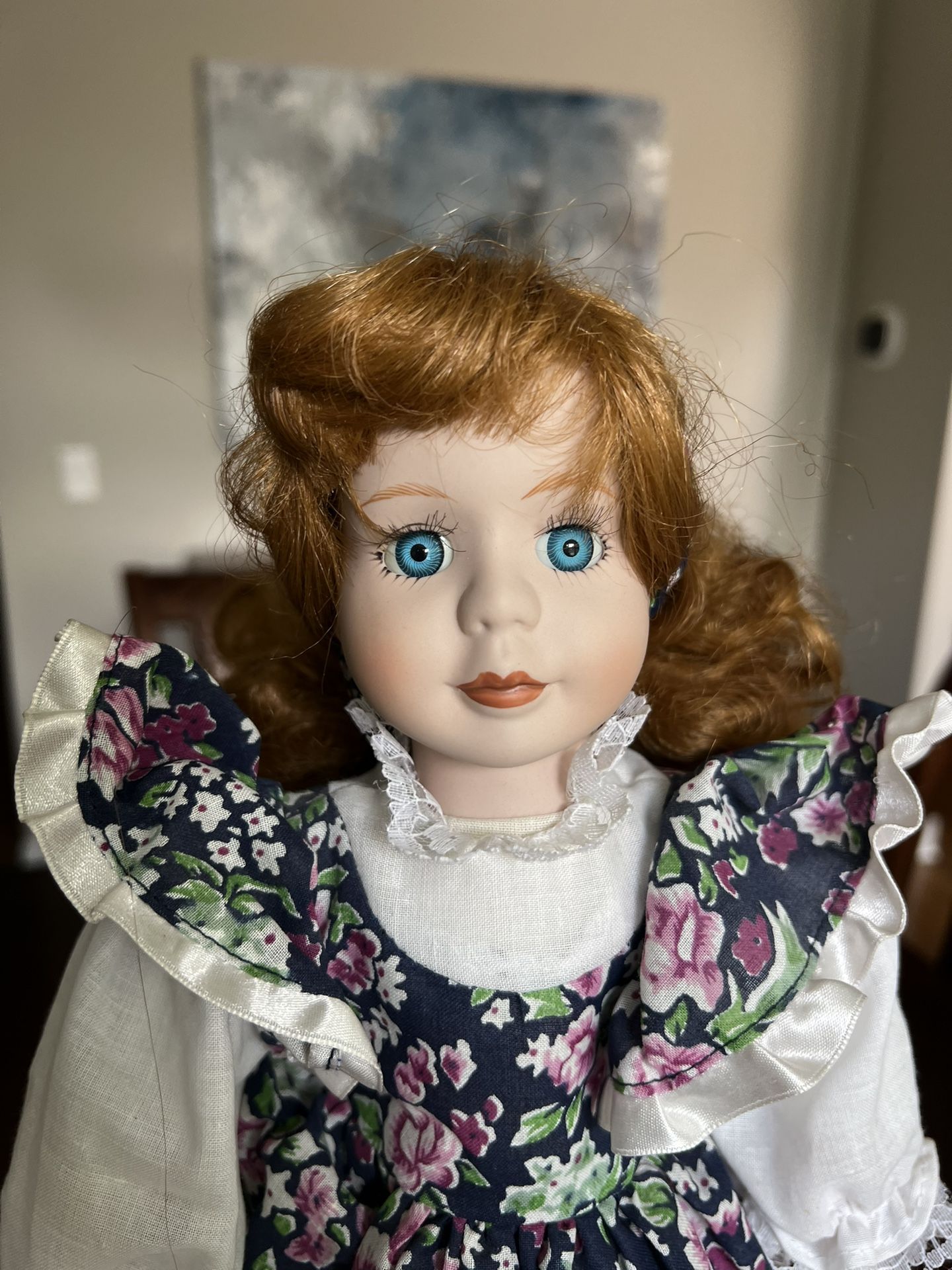 Geppeddo Doll Porcelain 16” light red hair, blue eyes Box, no stand Measurements are approximate. Non-smoking no pet home. Please see all photos