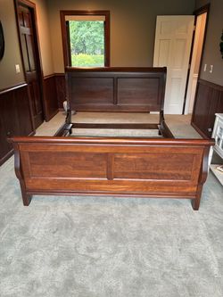 Queen Sleigh Bed  by Durham Furniture.