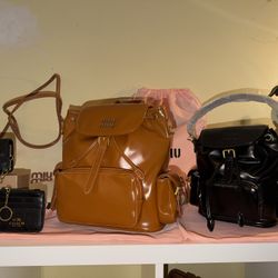 130$ Miu Miu 
