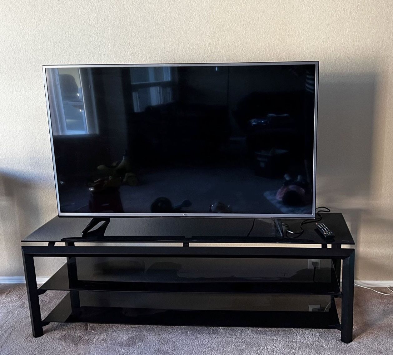 LG 55-inch Smart TV + Glass TV Stand