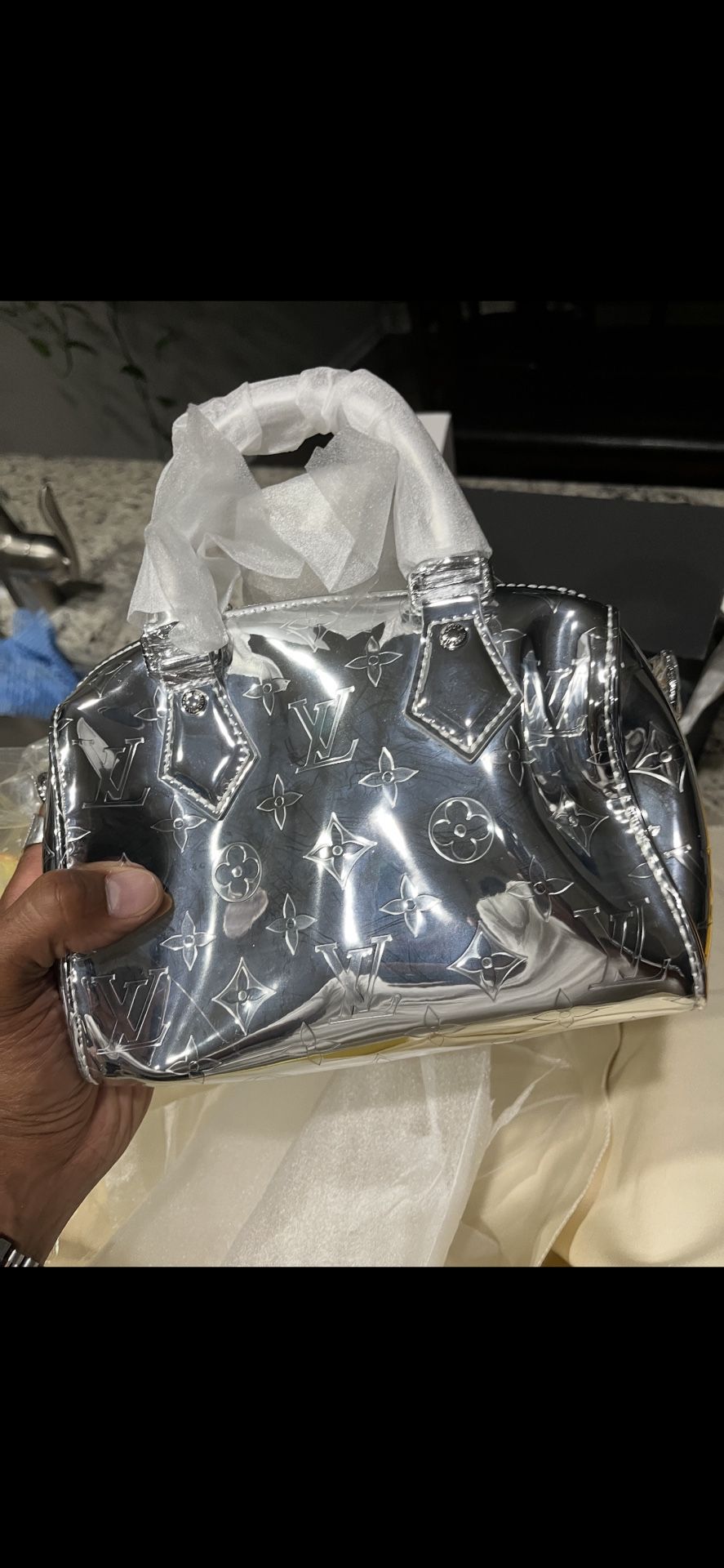 Louis Vuitton Speedy Bandoulière 20 Monogram bag in silver