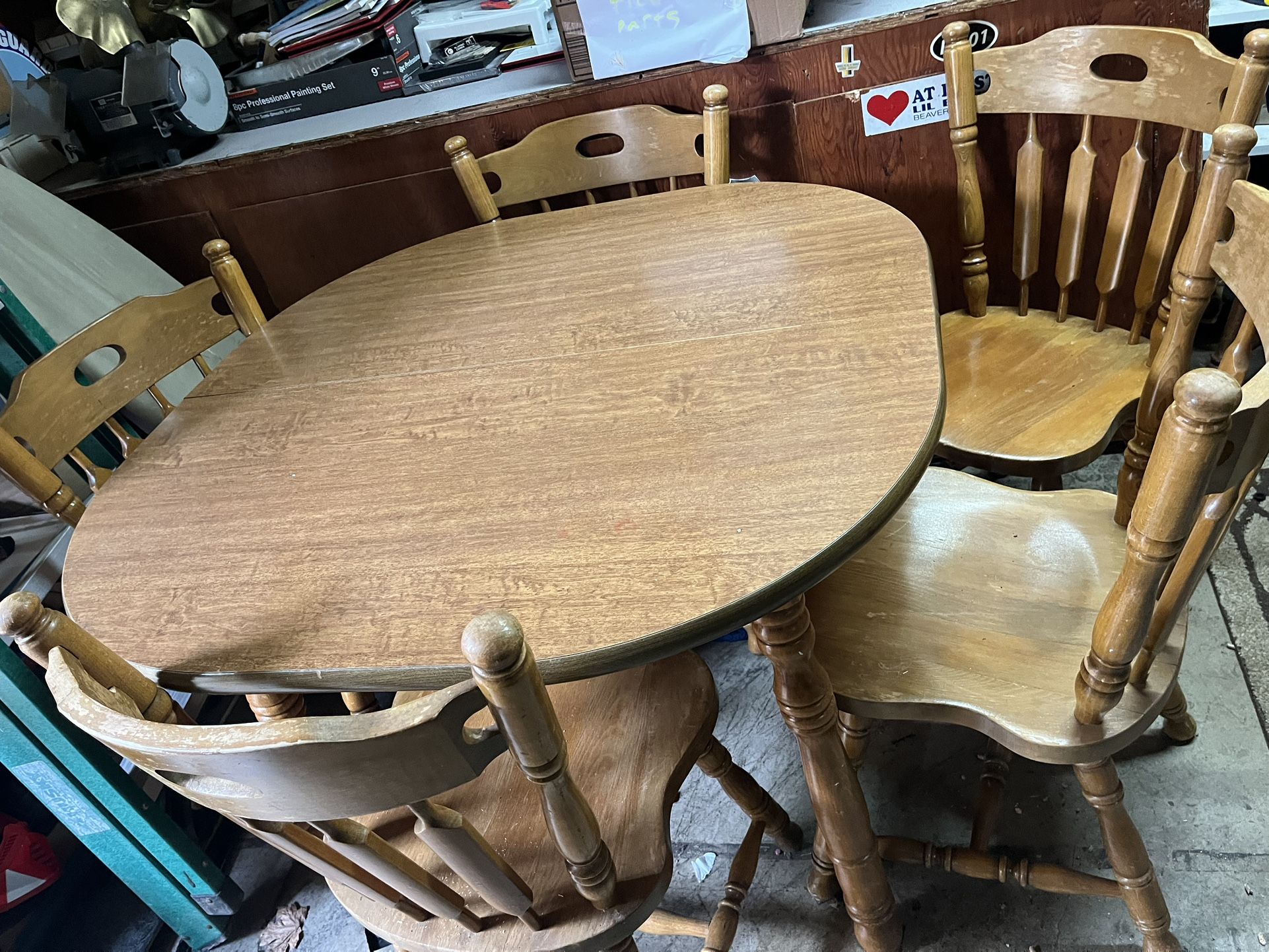 Wooden dining room table with 5 chairs