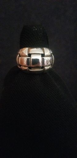 New. Heavy "woven" silver ring