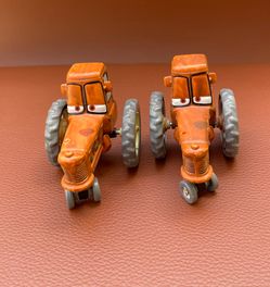 Rare set of 2 Disney Pixar Cars Holstein Heifer Chewall Tractor 2.5" Plastic Vehicles