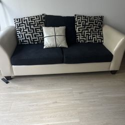 MUST GO! Luxe Leather Cream and black Couch w/decorative  pillows