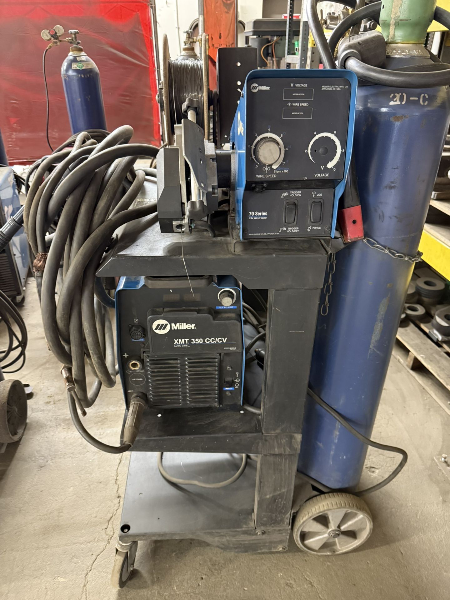 Miller XMT 350 CC/CV Welder With 70 Wire Feeder And Cart