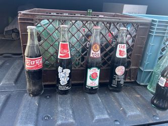 Vintage Coke and 7-up bottles