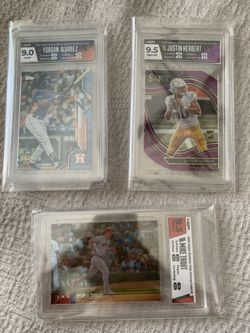 HGA Graded Justin Herbert RC, Yordan Alvarez RC, Mike trout
