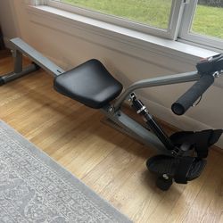 Rowing exercise machine