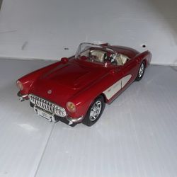 Amazing 1957 Chevy Corvette, red AM/FM radio display car toy works on three AA batteries tested but only works on a.m. frequency, no FM band 