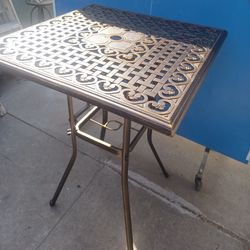 square metal outdoor table