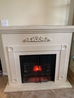 Faux limestone fireplace