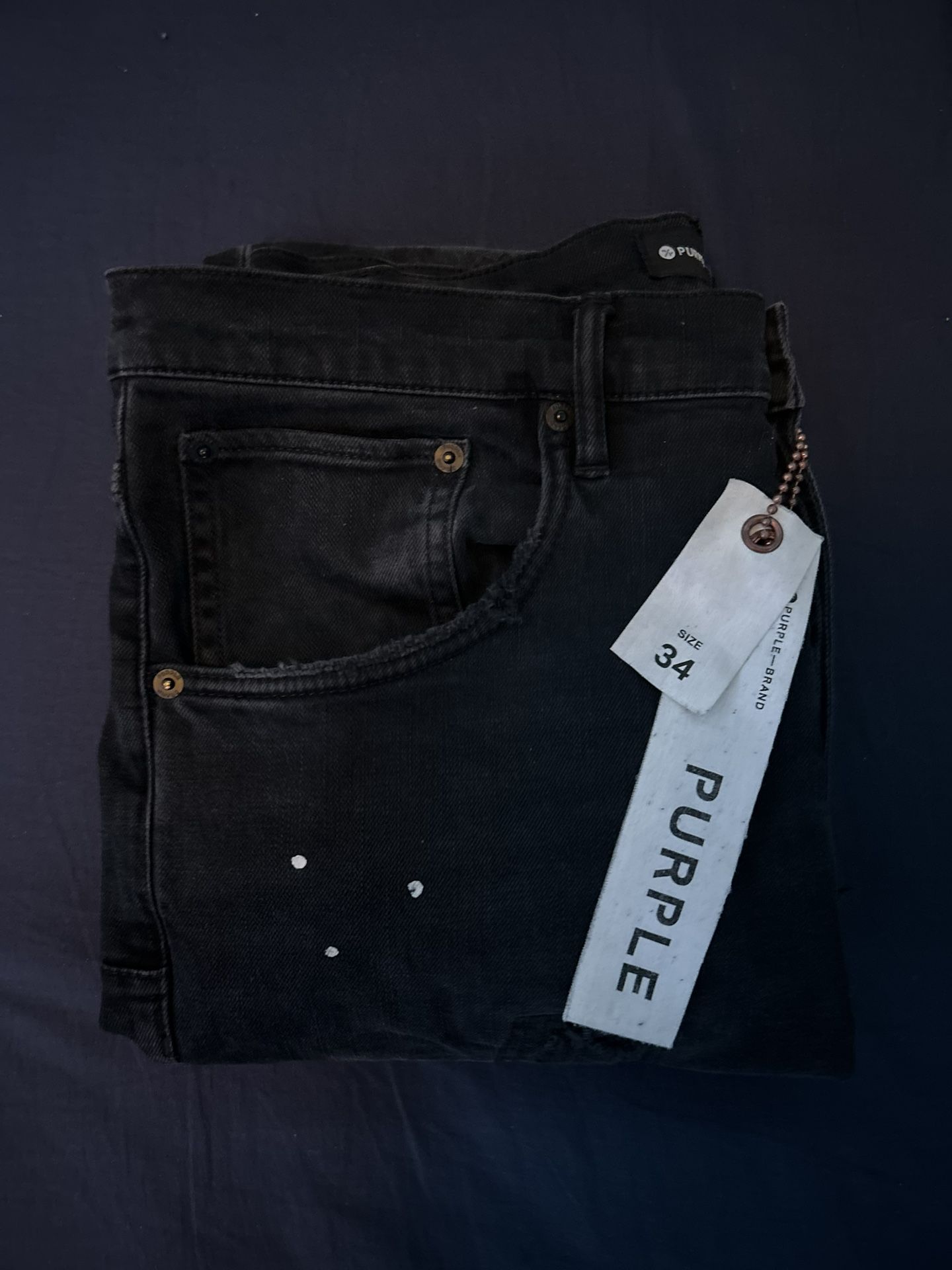 purple jeans size 34