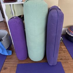 Various Yoga Bolsters And Props