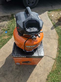 RIDGID 6 Gal. 150 PSI Portable Electric Oil-Free Jobsite Pancake Air Compressor with Dual Pressure Gauges and 2-Quick Couplers