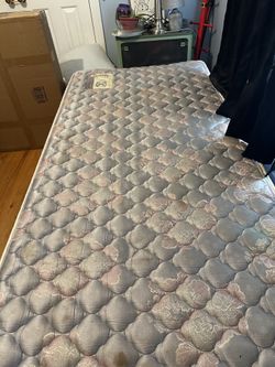 Twin size bed with mattress and bed frame