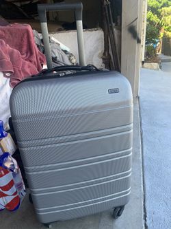 10 1/2x 17 1/2 X 27 Silver Spinner Suitcase From Hartmann. Similar Retails $249-$300+