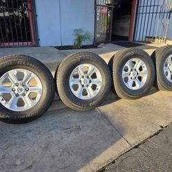 17" Toyota OEM rims 265-70R17 Tires.  $550