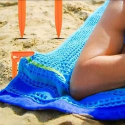 Beach Towel Holders – Keep Your Towels Secure on Windy Days!