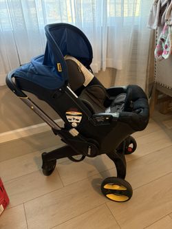 Doona Stroller + accessories 