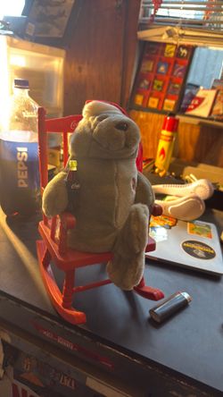 Coke seal in rocking chair. Chair rocks