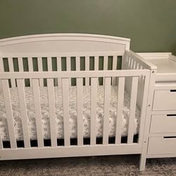 Crib with changing table dresser