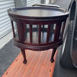 Vintage hand carved walnut cabinet with oval tray