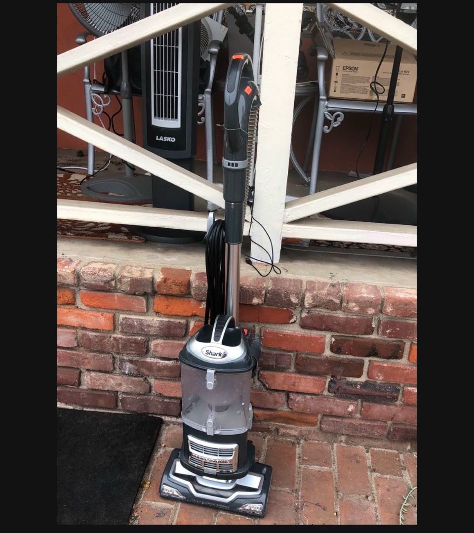 Almost New Shark Vacuum Tested Works Perfectly when you come ill fully test it for you