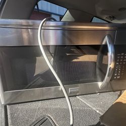 Frigidaire Gallery over-the-range microwave in a stainless steel finish.