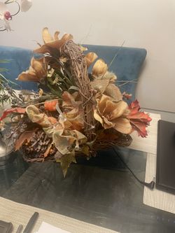 Artificial Flowers arranged in a Basket 