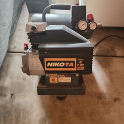 Nikota Air Compressor! Works Perfectly! 2 HP...4 GALLON TWIN TANK!
